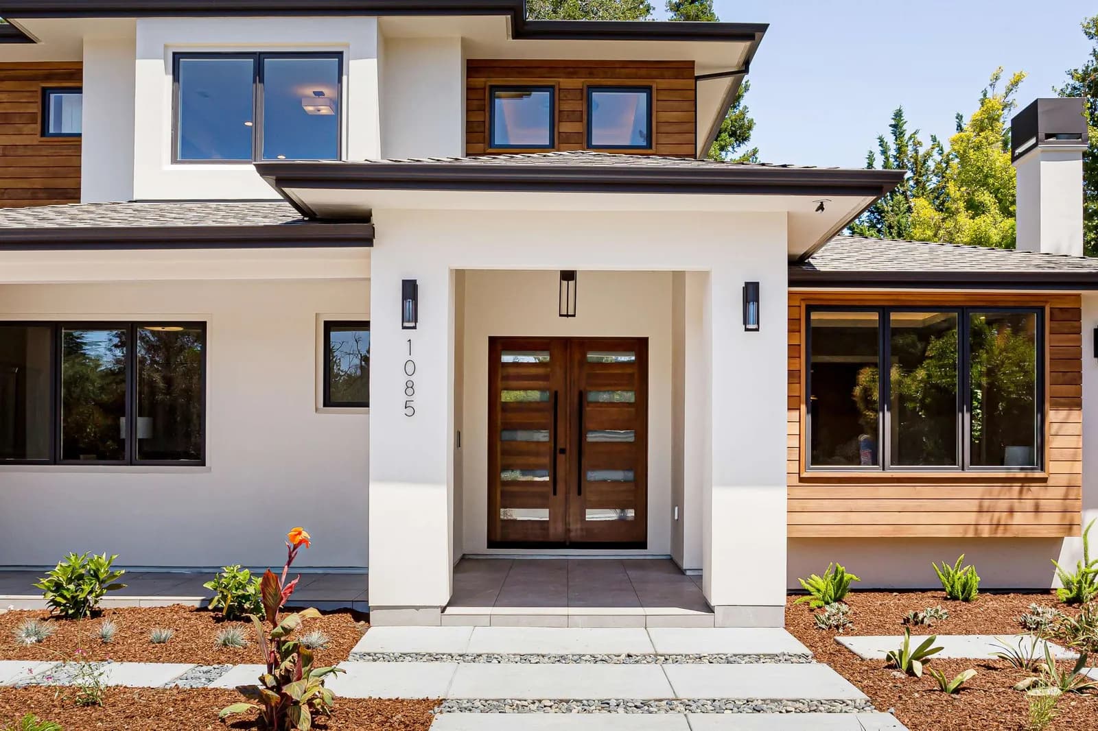 Front entrance of the custom home at 1085 Golden Way